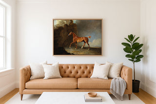 A Golden Chestnut Racehorse by a Rock Formation