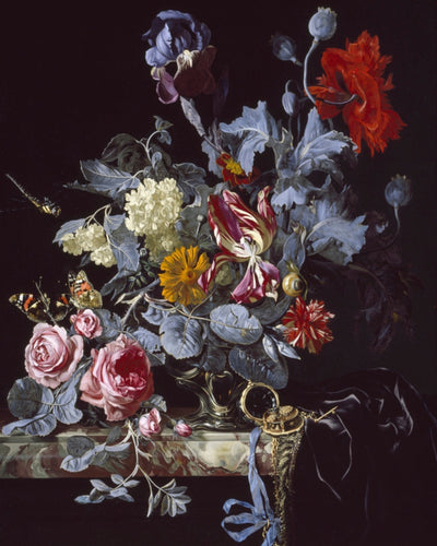 A VASE OF FLOWERS WITH A WATCH