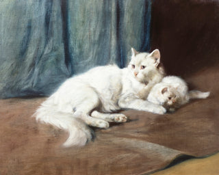 A White Persian Cat and Her Kittens