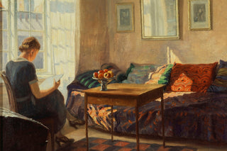 A WOMAN READING AT A WINDOW
