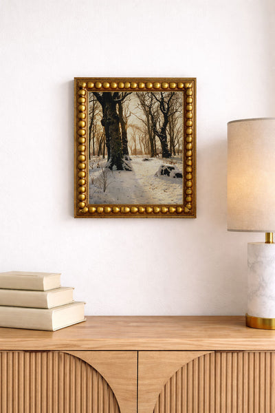 A Wooded Winter Landscape With Deer