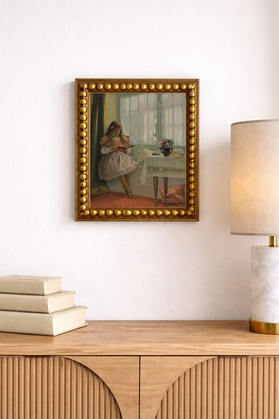 A Young Girl Reading by the Window