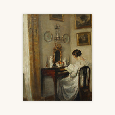 AN INTERIOR WITH A GIRL READING AT A DESK — Primary Image