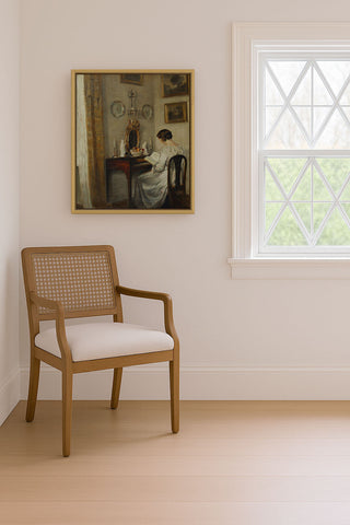 An Interior with a Girl Reading at a Desk