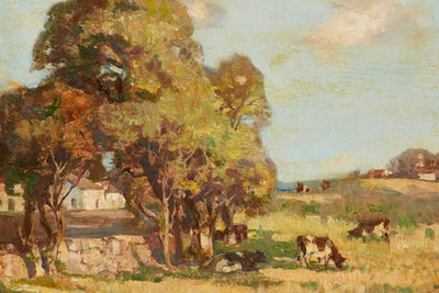 CATTLE GRAZING IN A PASTORAL LANDSCAPE