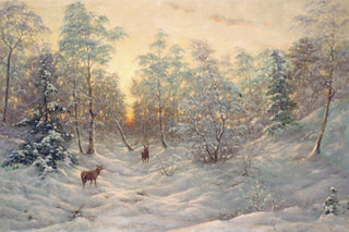 DEER IN A SNOWY LANDSCAPE AT DUSK