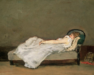 FAIR HAIRED WOMAN ON A SOFA
