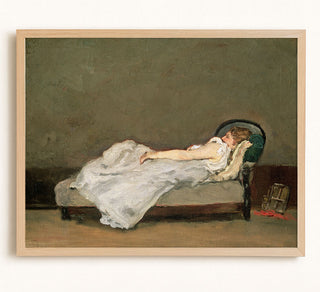 FAIR HAIRED WOMAN ON A SOFA