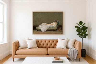 FAIR HAIRED WOMAN ON A SOFA