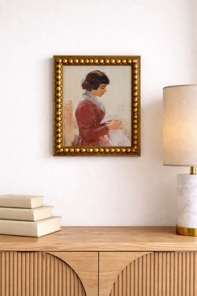 Girl in Red Sewing
