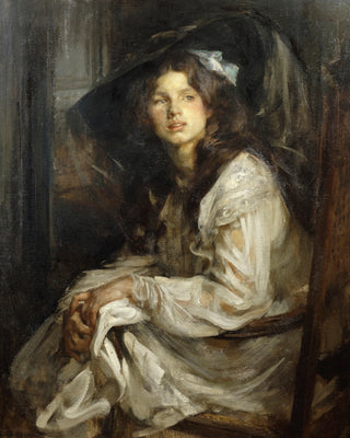 GIRL SEATED IN A CHAIR