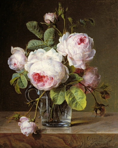 ROSES IN A GLASS VASE ON A LEDGE