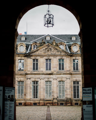 THROUGH THE ENTRANCE TO THE PALAIS ROHAN