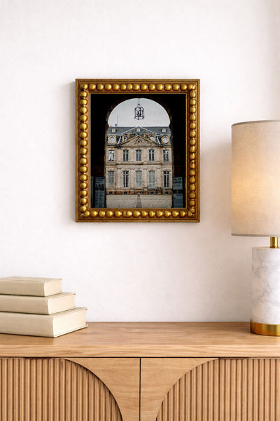 THROUGH THE ENTRANCE TO THE PALAIS ROHAN