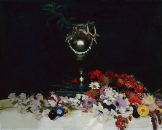 URN AND FLOWERS ON A TABLE