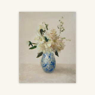 WHITE FLORAL IN A BLUE AND WHITE VASE — Primary Image