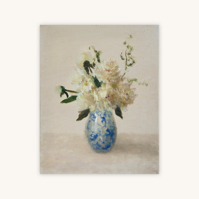WHITE FLORAL IN A BLUE AND WHITE VASE — Primary Image