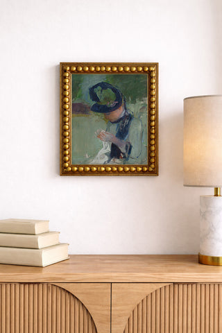 Woman Wearing a Black and Green Hat, Sewing