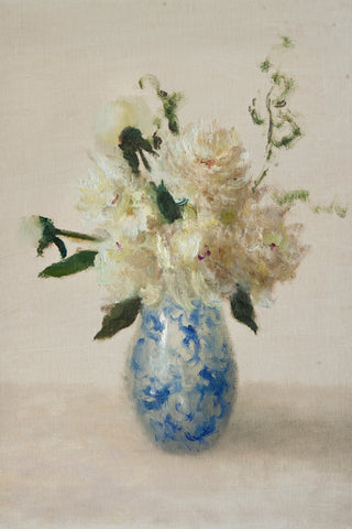 WHITE FLORAL IN A BLUE AND WHITE VASE